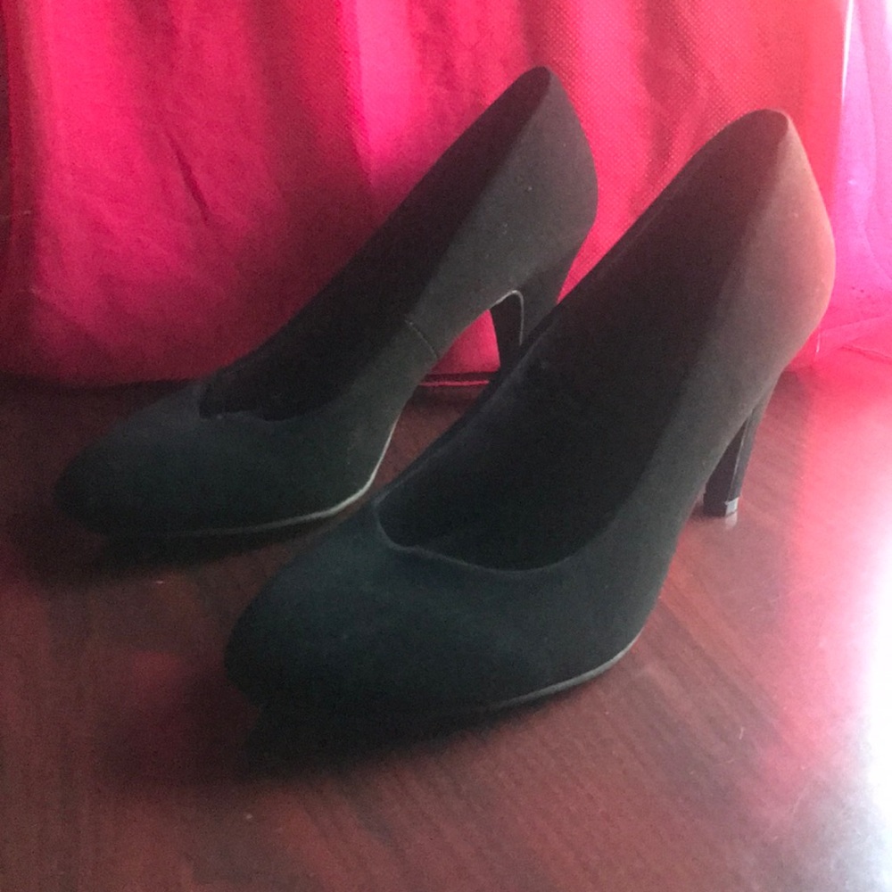 Black suede pumps.